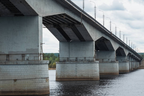 istock concrete road bridge over the river 1607971112