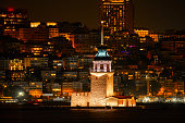 Maidens Tower with istanbul cityscape at night