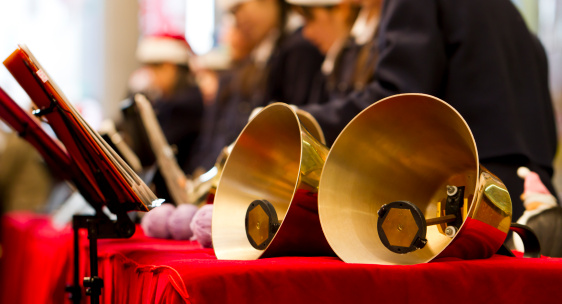 Brass handbells at musical performance.
