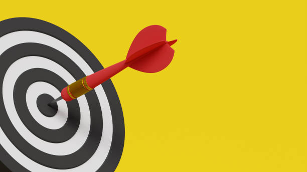 istock Dart hitting a target on the center on yellow background with copy space. 3d render illustration 1608029336