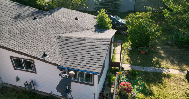 istock Senior man cleans roof gutter, overhead view 1608068238
