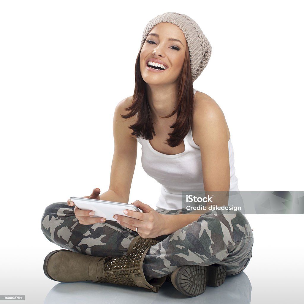 Bellissima giovane donna utilizzando PC Ultramobile - Foto stock royalty-free di Abbigliamento
