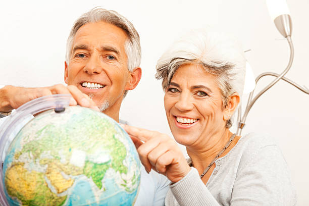 istock senior couple planning a world tour 160813564