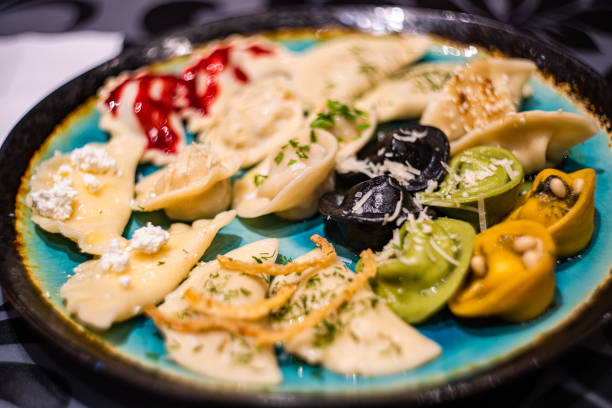 istock Variety of different stuffed dumplings 1608182909