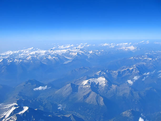 Aerial view of the alps mountains stock photo