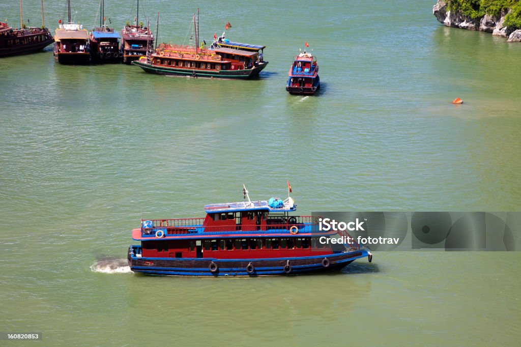 Vietnamese Junk cruising on Halong Bay, Hanoi, Vietnam Luxury Chinese Junk on Halong Bay Asia Stock Photo