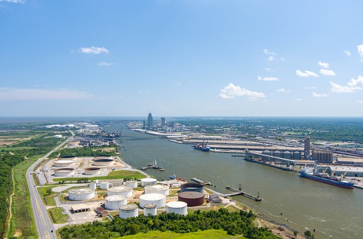 Aerial view of the downtown Mobile, Alabama skyline and the Mobile River on a summer day