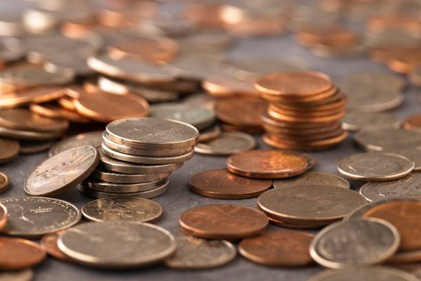 istock Close up photo of various US coins. 1608230340