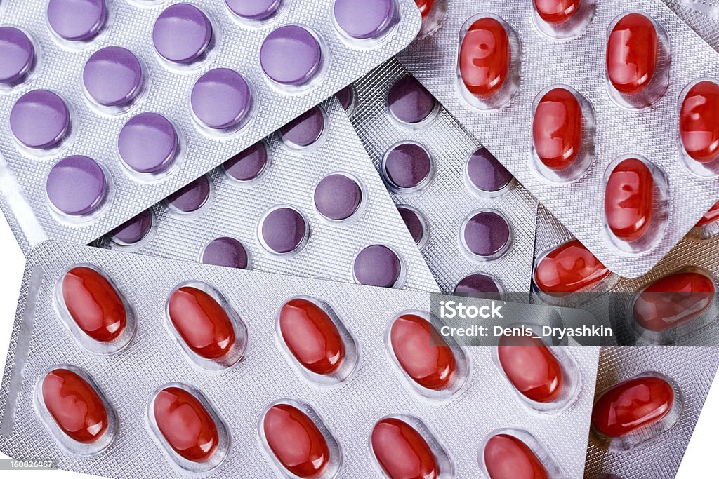 Pilules médicaments emballés dans la formation des ampoules. - Photo de Antibiotique libre de droits
