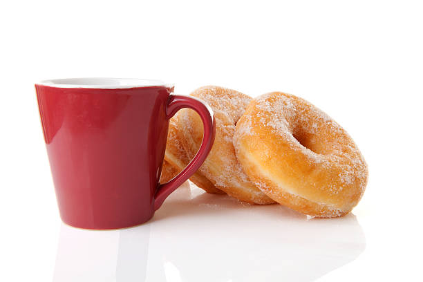 istock cup of coffee and donuts 160833283