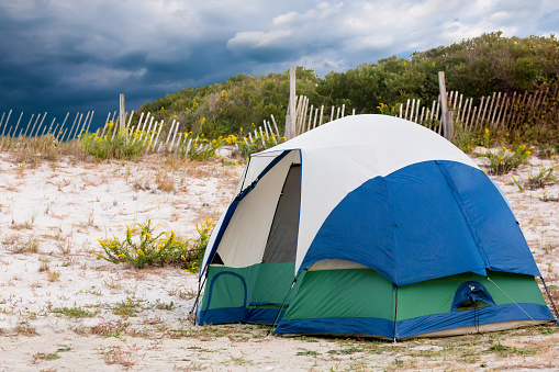 A camping tent near sand dunes at Assateague Island National Seashore, Maryland