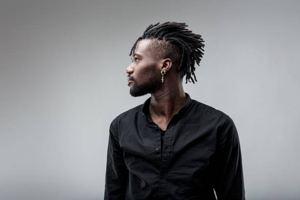 istock Beautiful man, black shirt, looks right relaxed 1608398675