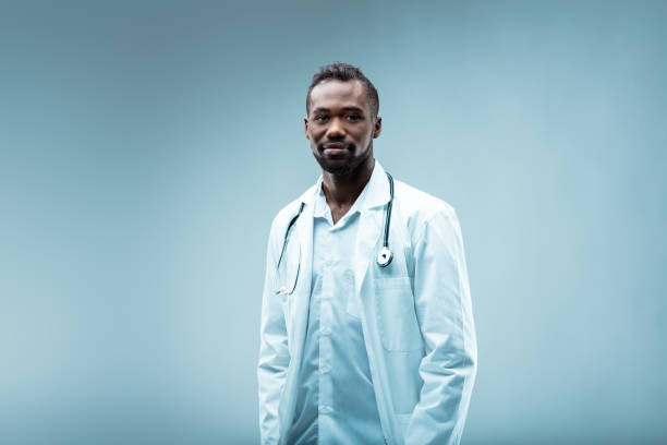 istock Black doctor, reassuring smile, supportive 1608399178