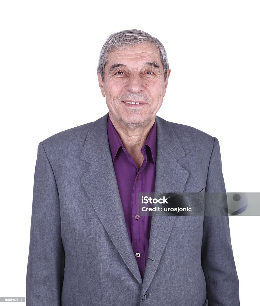 Portret szczęśliwy starszy człowiek w puste przeciwko biały - Zbiór zdjęć royalty-free (60-64 lata)