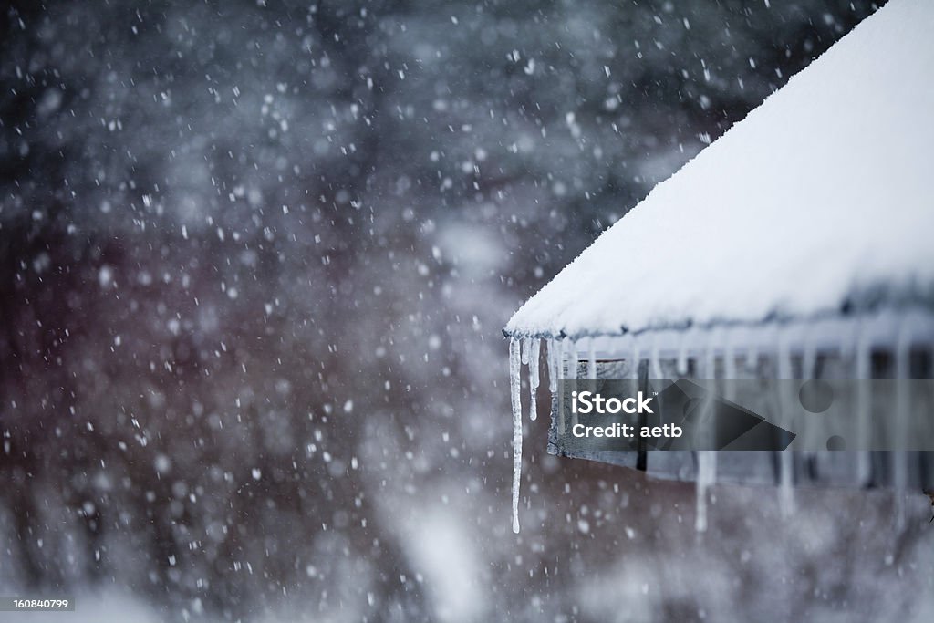 Icicles and Snowstorm Winter Stock Photo