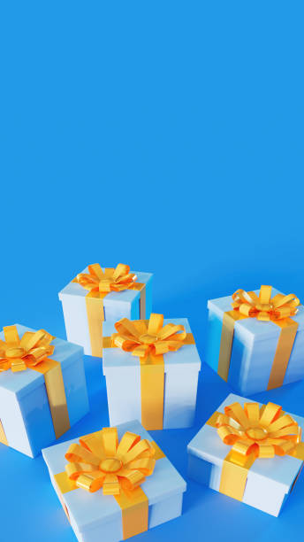 istock Six gift boxes with yellow ribbon and bow grouped together on blue stage, surprise and celebration 1608470230