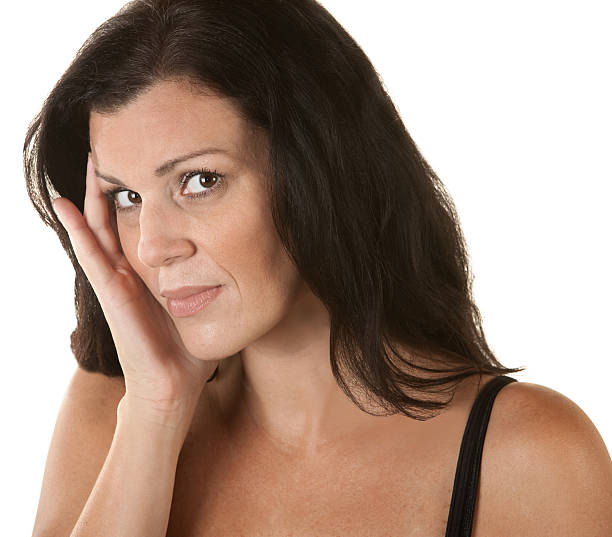 istock Woman with Hand on Side of Face 160856623