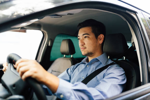 istock Portrait of a driver man paying attention 1608584346