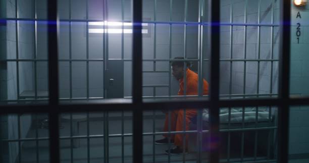 istock Prisoner gives food from serving trolley 1608594681