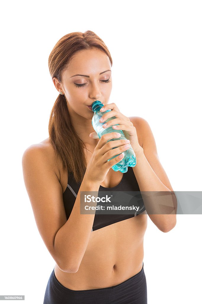 スポーティな女性の飲料水 - 1人のロイヤリティフリーストックフォト