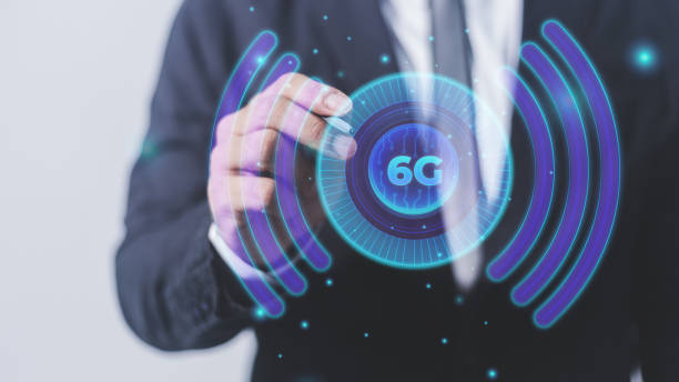 istock Businessman on blurred background drawing 5G network hologram 3D rendering 1608619428