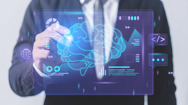 istock Businessman drawing a holographic projection of a human brain on a touch screen interface 1608619430
