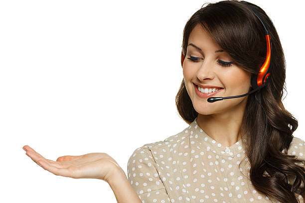 istock Smiling woman in headset holding empty copy space on palm 160865871