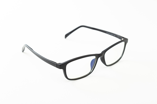 Pair of glasses with a black frame isolated on a plain white background. Copy space.