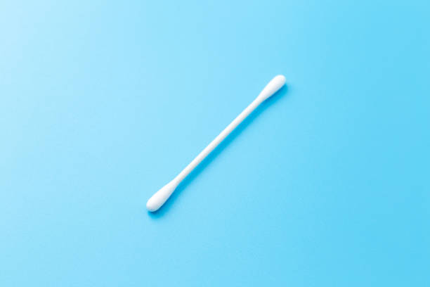 istock Cotton swabs on blue background. 1608691480