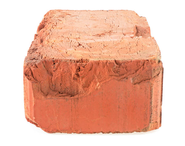 istock Old red brick isolated on a white background. Single red clay rough brick. 1608727235