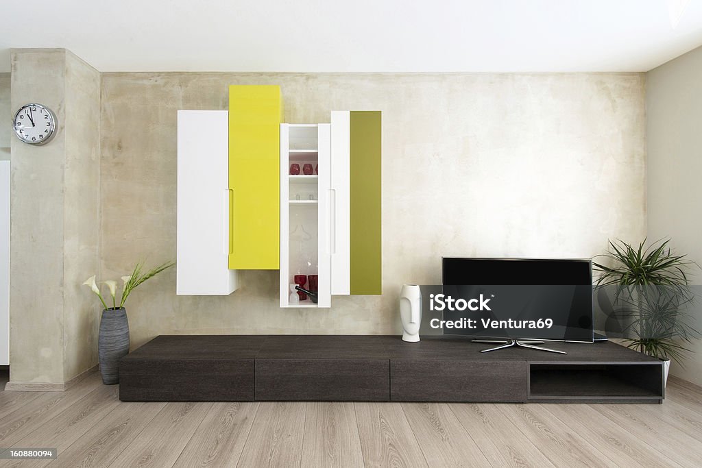 modern living-room interior detail of modern living-room interior, cabinets and TV set Apartment Stock Photo