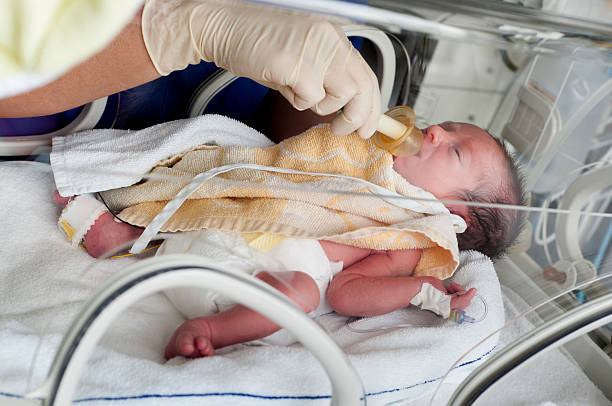 istock Newborn baby in incubator 160882163