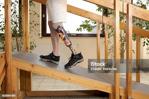 Male Prosthesis Wearer Training To Climb A Slope Stock Photo - Download Image Now - Sports Ramp, Amputee, Recovery