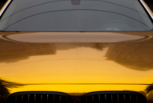 Golden painted sports car in Beijing, China