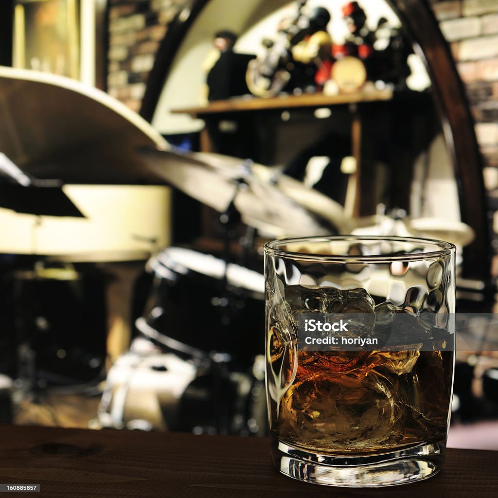 whiskey on the rocks glass of whiskey on the table in jazz bar Jazz Music Stock Photo