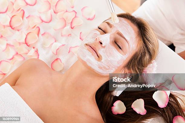 Beautician Applying A Face Mask Stock Photo - Download Image Now - Beauty Product, Healthcare And Medicine, Rose - Flower