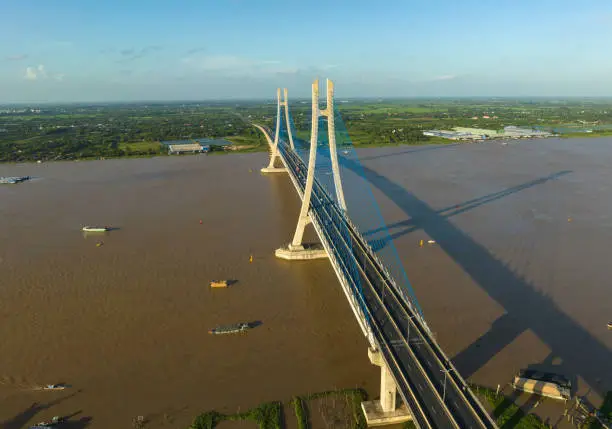 Aerial video of Vam Cong bridge spanning the two banks of Hau River, Can Tho province. Vam Cong Bridge is the second cable-stayed bridge crossing the Hau River and the fifth cable-stayed bridge in the Mekong Delta (Mekong Delta). This is also the ninth major bridge of trillions inaugurated to traffic in the Mekong Delta from 2000 to present.