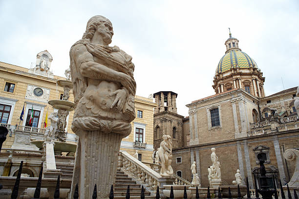 Closeup view over the fountain of Diana on Archimede's square in Ortygia island in ancient city Syracuse in Sicily, southern Italy