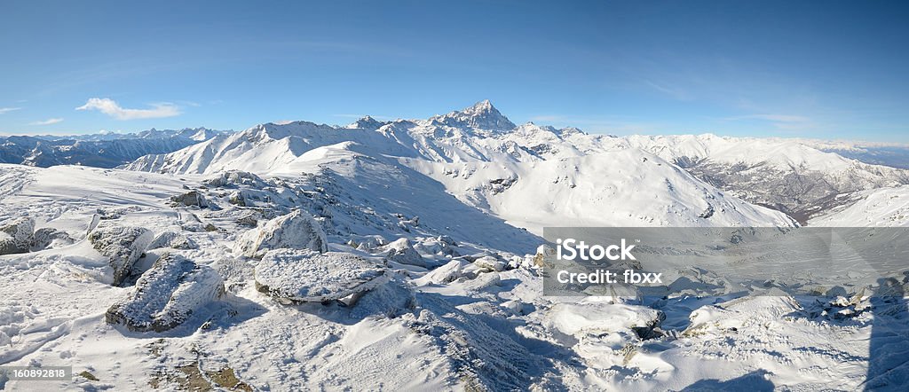 XL winter panorama of high mountain range Superb panoramic view of M. Viso (3841 m) mountain range, in a frozen scenery. Piedmont, italian Alps (5 single photos stitched) Cold Temperature Stock Photo
