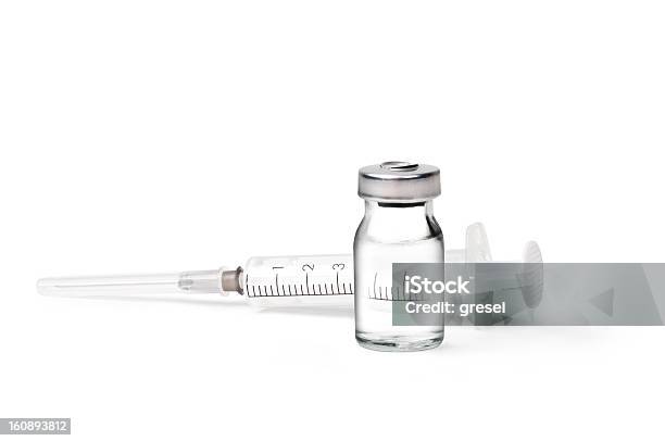 A Medical Ampoules And Syringe Lay Down Stock Photo - Download Image Now - Syringe, Vial, White Background