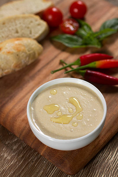 istock Humus in white bowl side dish 160895345