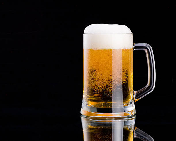 Mug Fresh Beer With Cap Of Foam On Black Background Stock Photo - Download Image Now - iStock Mug Fresh Beer With Cap Of Foam On Black Background Stock Photo - Download Image Now - iStock
