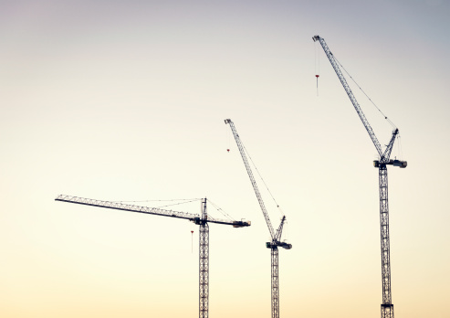 Construction Cranes at Dawn