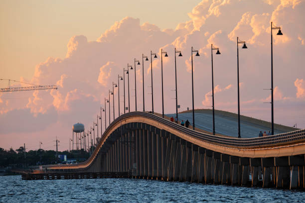 istock Barron Collier Bridge and Gilchrist Bridge in Florida with moving traffic. Transportation infrastructure in Charlotte County connecting Punta Gorda and Port Charlotte over Peace River 1608961564