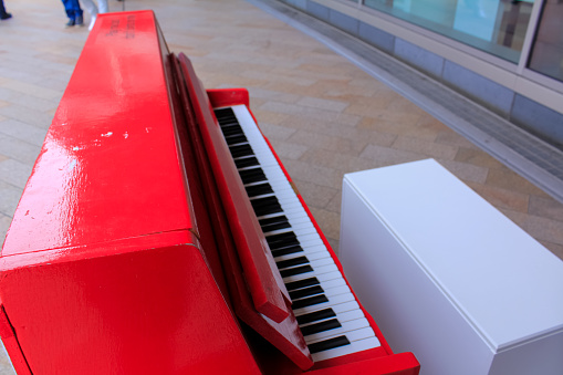 Beautiful piano background are set by the window in the morning waiting for the pianist to come to practice in the morning to reduce the mistake of having to perform the piano performance at a concert