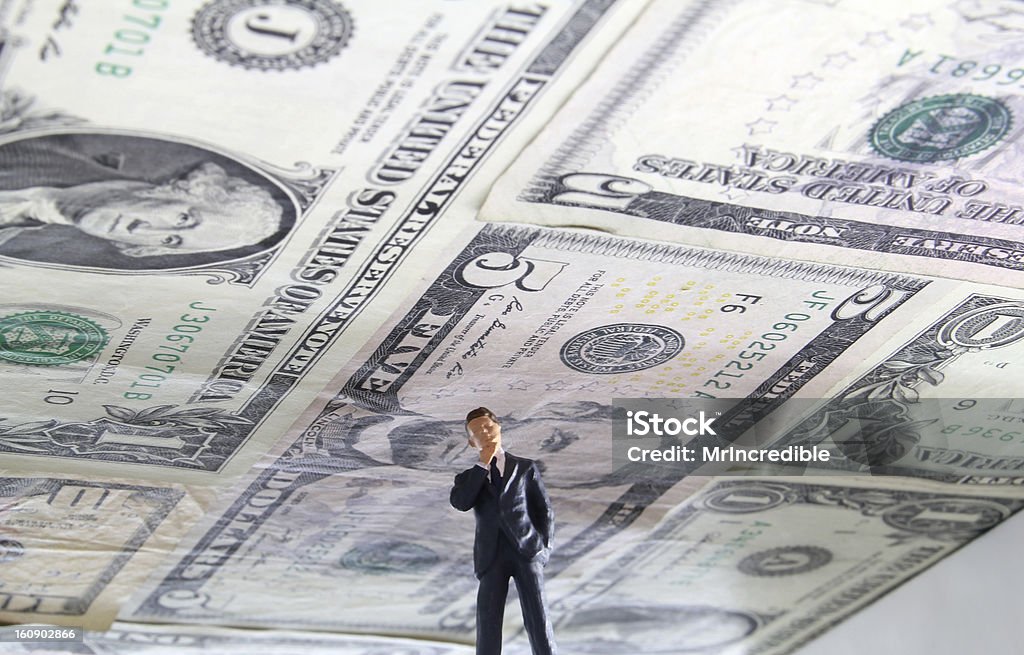 Debt Ceiling Political figure standing under a ceiling made of US money. Debt Ceiling Stock Photo