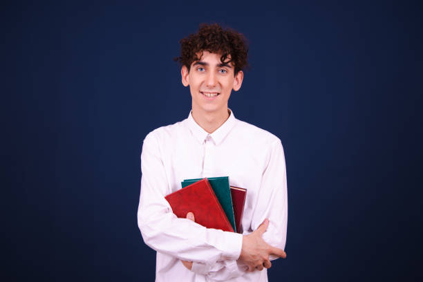 istock Funny emotional guy is preparing for exams. 1609036569