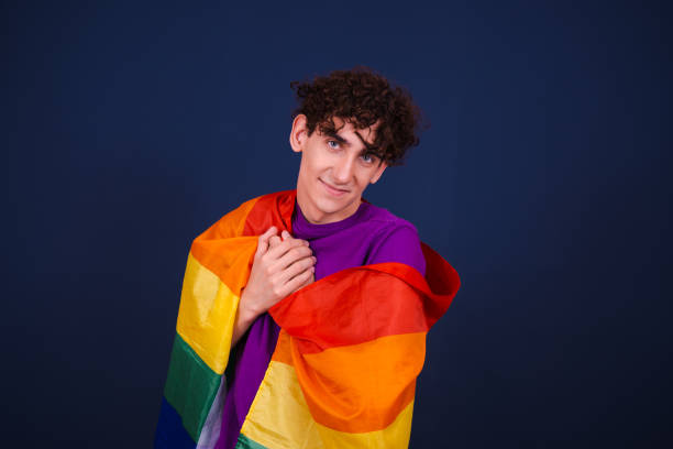 istock Fight for equal rights. Funny emotional guy with a gay flag. 1609037229