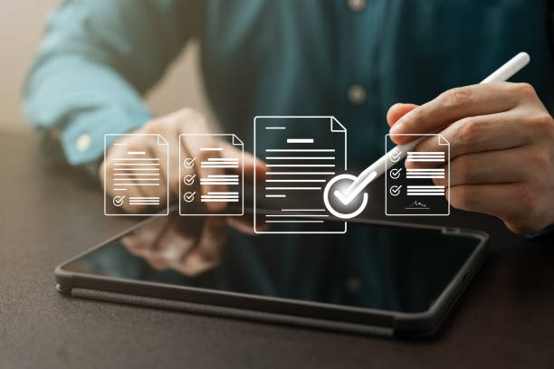 istock business performance with online surveys, exams and evaluations, Watch as a professional businessman uses checklists to drive success and growth. Discover the power of assessment today 1609037258