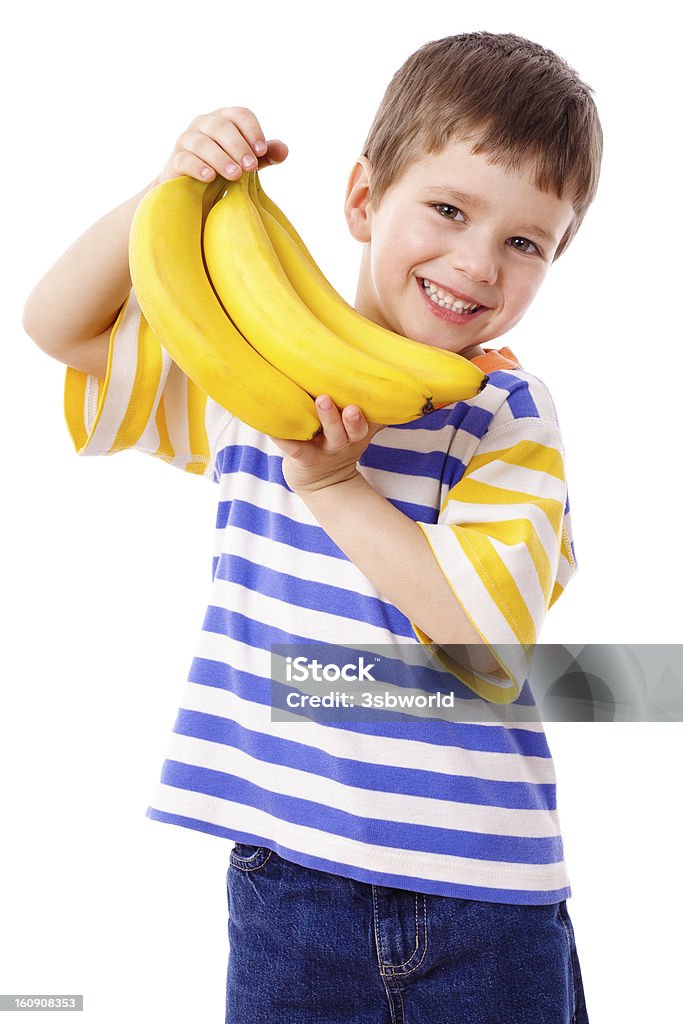 Happy boy holds a bunch of bananas Happy boy holds a bunch of bananas, isolated on white Banana Stock Photo